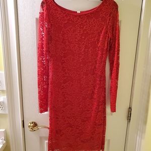 Women's medium form fitting red lace dress.